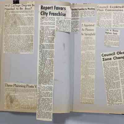 Pages 24-25 newspaper clippings unfolded
