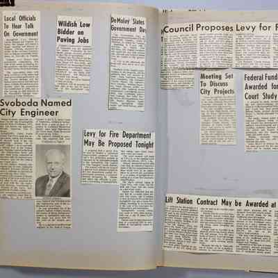 Pages 26-27 newspaper clipping unfolded