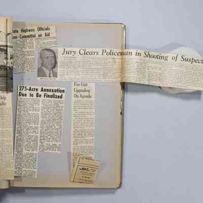 Pages 28-29 newspaper clipping unfolded