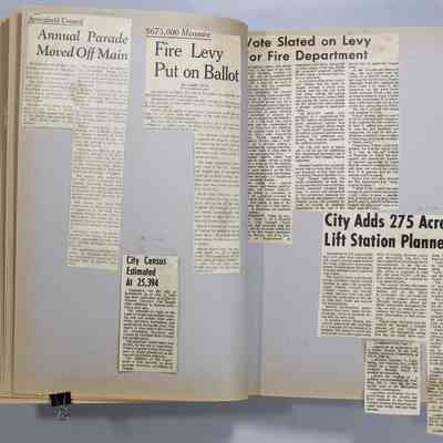 Pages 30-31 newspaper clipping unfolded