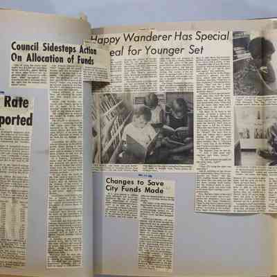 Pages 42-43 newspaper clipping unfolded