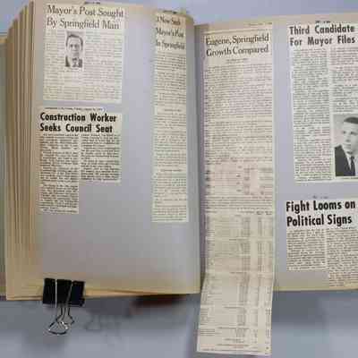 Pages 48-49 newspaper clipping unfolded
