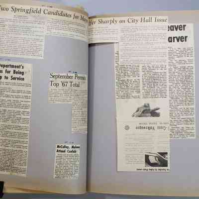 Pages 58-59 newspaper clipping unfolded