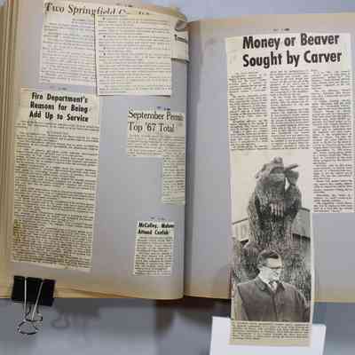 Pages 58-59 newspaper clipping unfolded