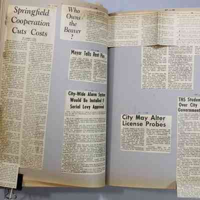 Pages 62-63 newspaper clippings unfolded