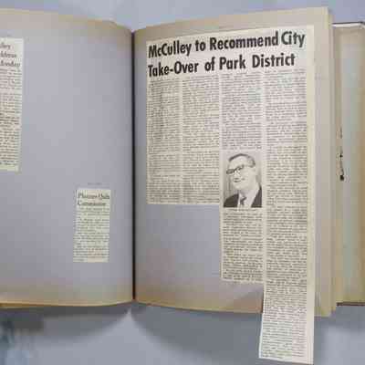 Pages 86-87 newspaper clipping unfolded