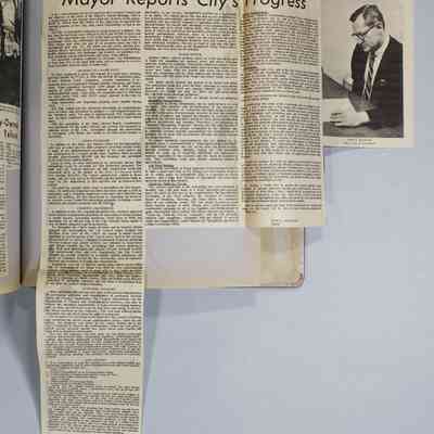 Pages 92-93 newspaper clipping unfolded