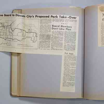Pages 100-101 newspaper clipping unfolded