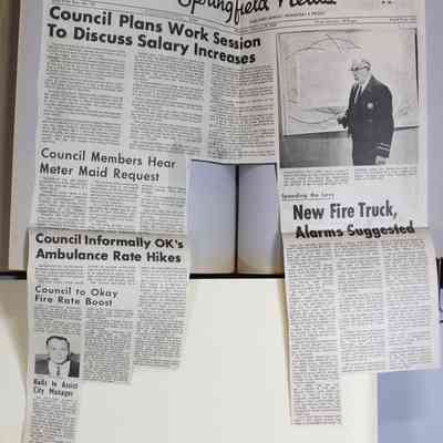 Pages 102-103 newspaper clipping unfolded