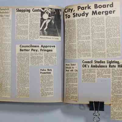 Pages 104-105 newspaper clipping unfolded
