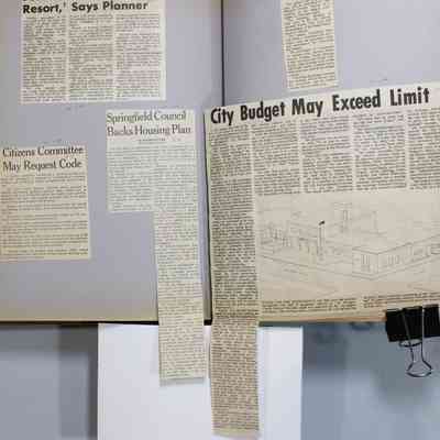 Pages 110-111 newspaper clipping unfolded