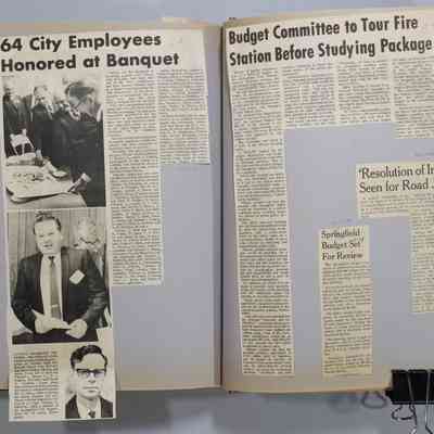 Pages 114-115 newspaper clipping unfolded