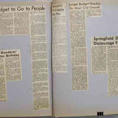 Pages 132-133 newspaper clipping unfolded