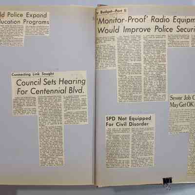 Pages 136-137 newspaper clipping unfolded