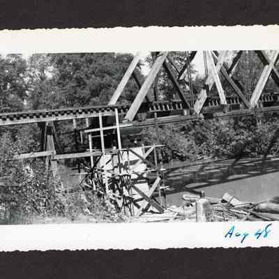 Photograph of construction on an unknown railroad bridge, 1948
