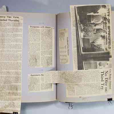 Pages 134 - 135 newspaper clipping unfolded