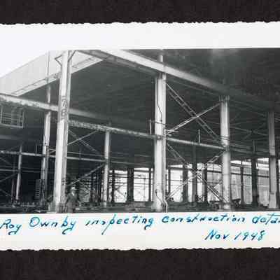 Photograph of Roy Ownby inspecting construction details