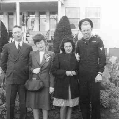 Photograph of Walt and Edythe Laxton, Lily Mendel and Walt Jr. Laxton