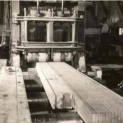 Photograph of Worker Operating a Gang Saw, Undated