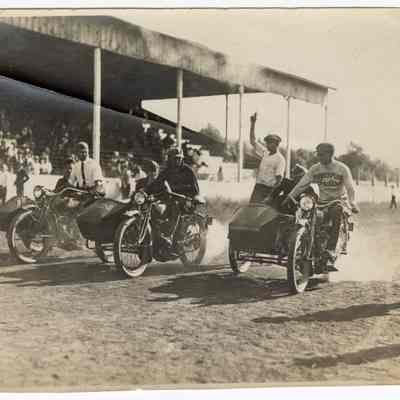 Photograph of motorcyclists at a race, undated