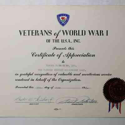 Award in folder in-between pages 77 and 72