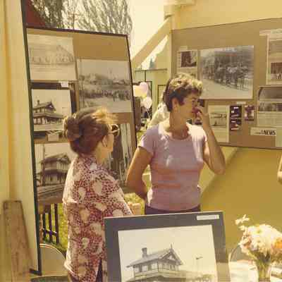 Photograph of Three Women at the Broiler Festival Museum Booth, Springfield, OR, circa 1980