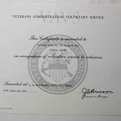 Award in folder in-between pages 77 and 72