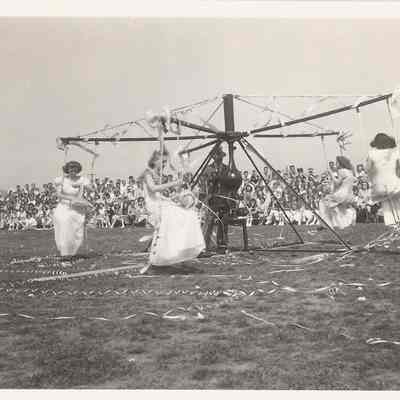 Photograph of the royal court on the merry-go-round at the Springfield High School springfest, Springfield, Oregon, 1947