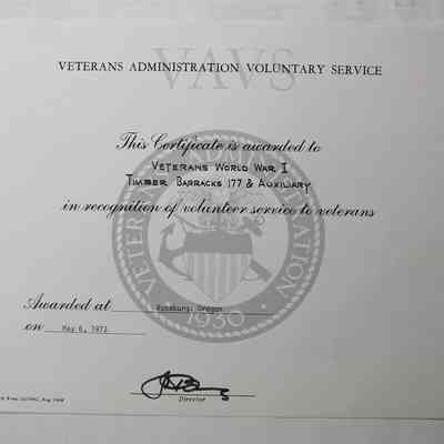 Award in folder in-between pages 77 and 72