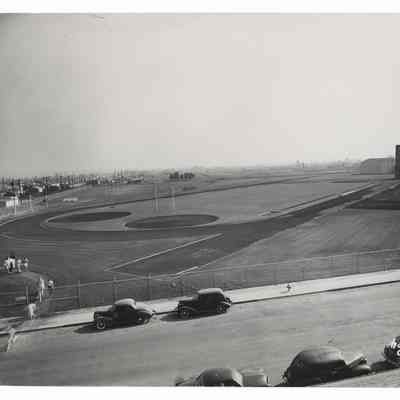 Photograph of a track and football field, and surrounding area, Springfield, circa 1950