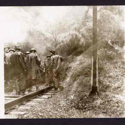 Photograph of Railroad workers during Railroad Slide, Near Springfield, Oregon, 1957
