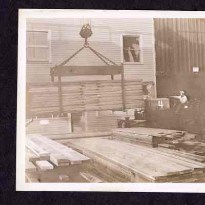 Photograph on postcard of lumber yard at Jones Lumber Company, Portland, Oregon, date unknown