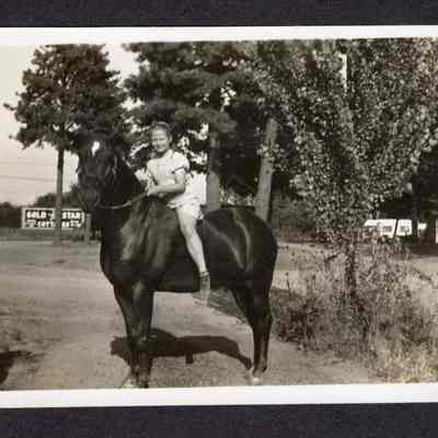 Photograph of Girl on Horse at Gold Star Auto Court, 1930s