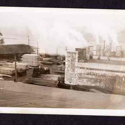 Photograph on postcard of green end of dry kilns at Jones Lumber Company, Portland, Oregon, date unknown