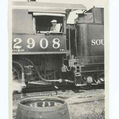 Photograph of Tommy Fox, age 10-12, on South Pacific train '2908'