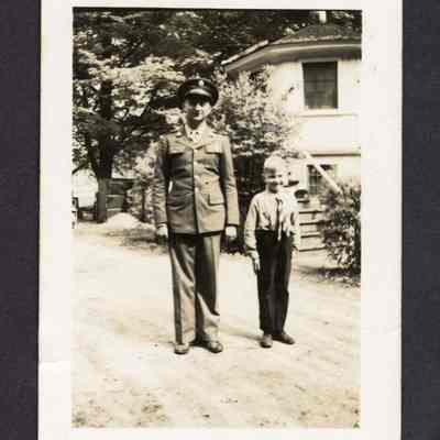 Photograph of James Ellis Myers and a boy, circa 1940