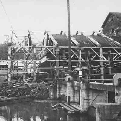 Photograph of Booth Kelly dam on log pond, 1956