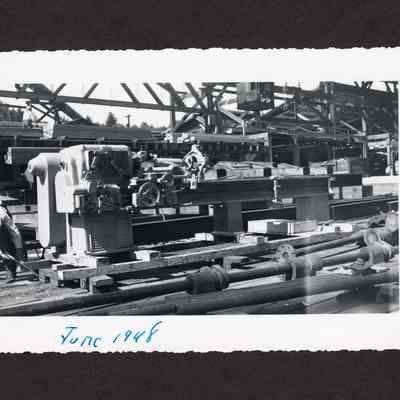 Photograph of lumber machinery at Booth-Kelly Lumber Co.