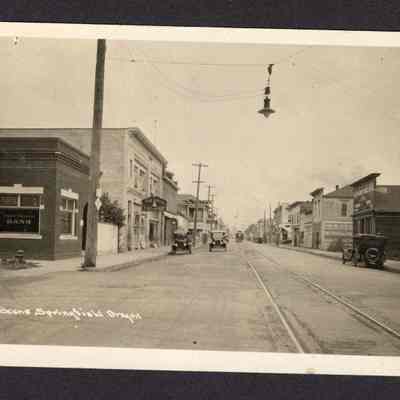 Photograph of Post Card of a Street Scene Springfield, Oregon. 2nd and Main St. Looking East. Post Mark August 13, 1925.