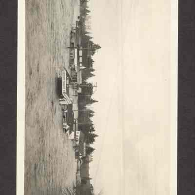 Photograph of homes and business flooded. Date unknown.