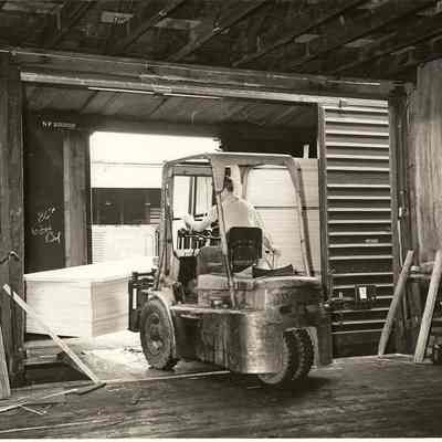 Photograph of Forklift worker, undated