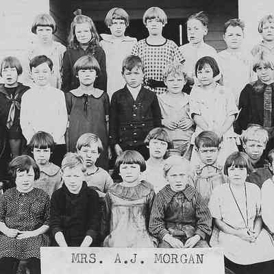Photograph of elementary students with teacher Mrs. AJ Morgan, Springfield, Oregon, date unknown.