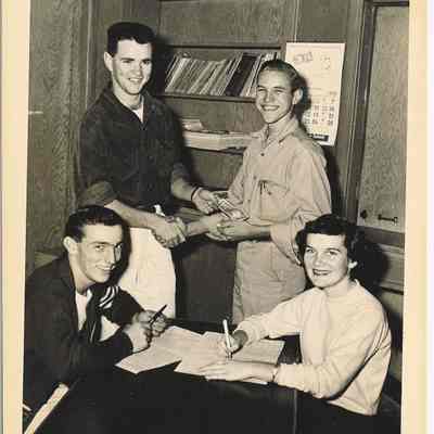 Photograph, Students Exchanging Money, Springfield High School, Undated.