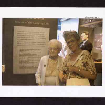 Photograph of Women at Springfield Museum's "Working in the Woods" Exhibit, Springfield, Oregon, 2000