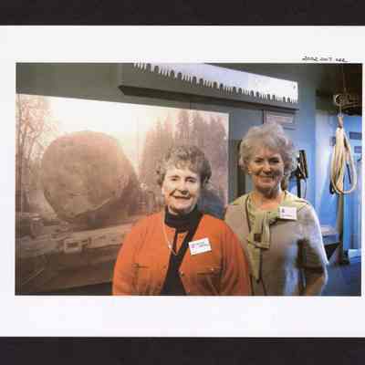 Photograph of Virginia Warren and friend at Springfield Museum's "Working in the Woods" Exhibit, Springfield, Oregon, 2000