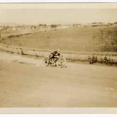 Photograph of motorcyclist Bill Davis senior on a speedway, undated
