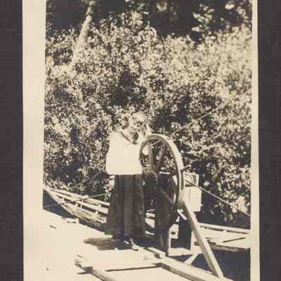 Photograph of young lady at a Ferry Wheel, Circa 1914