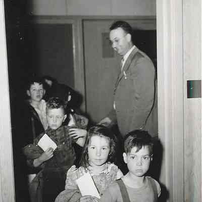Photograph of Mr. Sabin, Springfield High School's principal with children, Springfield, Oregon, unknown date