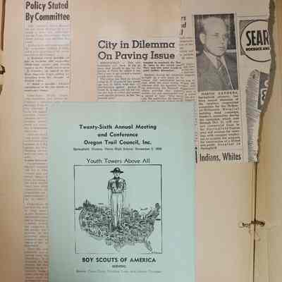 Page 46 pamphlet and loose newspaper clipping