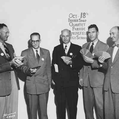 Photograph of five unknown men from Rotary Club Barbershop Quartet Parade, 1951